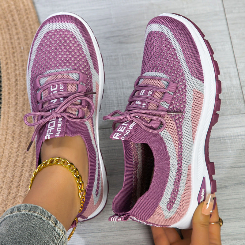 Women's flyknit mesh low-cut lightweight casual sneakers in a neutral tone, styled for everyday wear